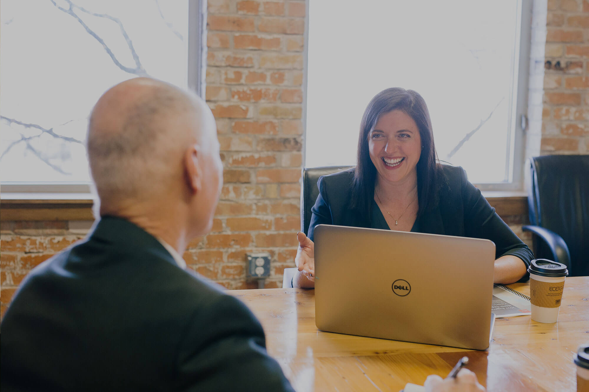 Two Business People Having Coffee